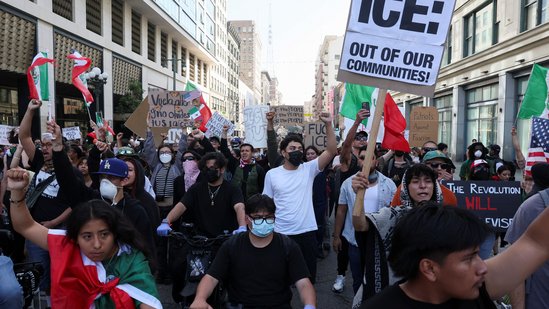 protesters march through downtown la streets during curfew hours