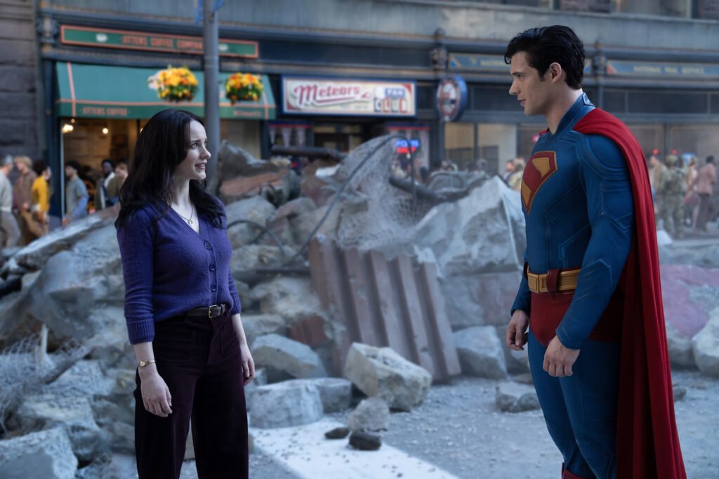 rachel brosnahan as lois lane standing with superman
