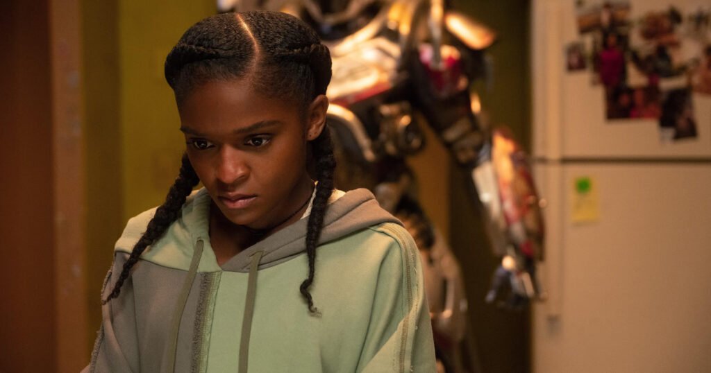 riri williams standing alone, contemplating her future as a marvel superhero
